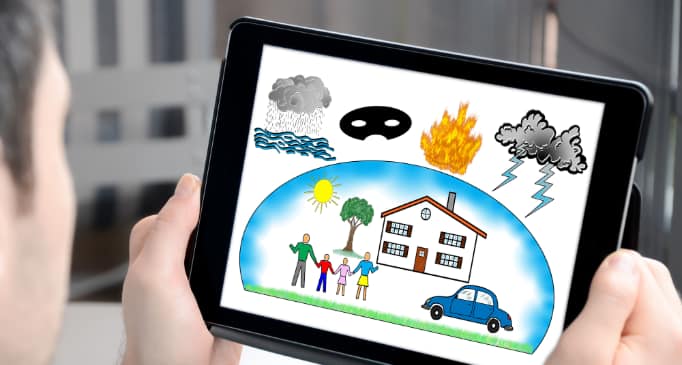 Person holding tablet with drawing of risks families must consider